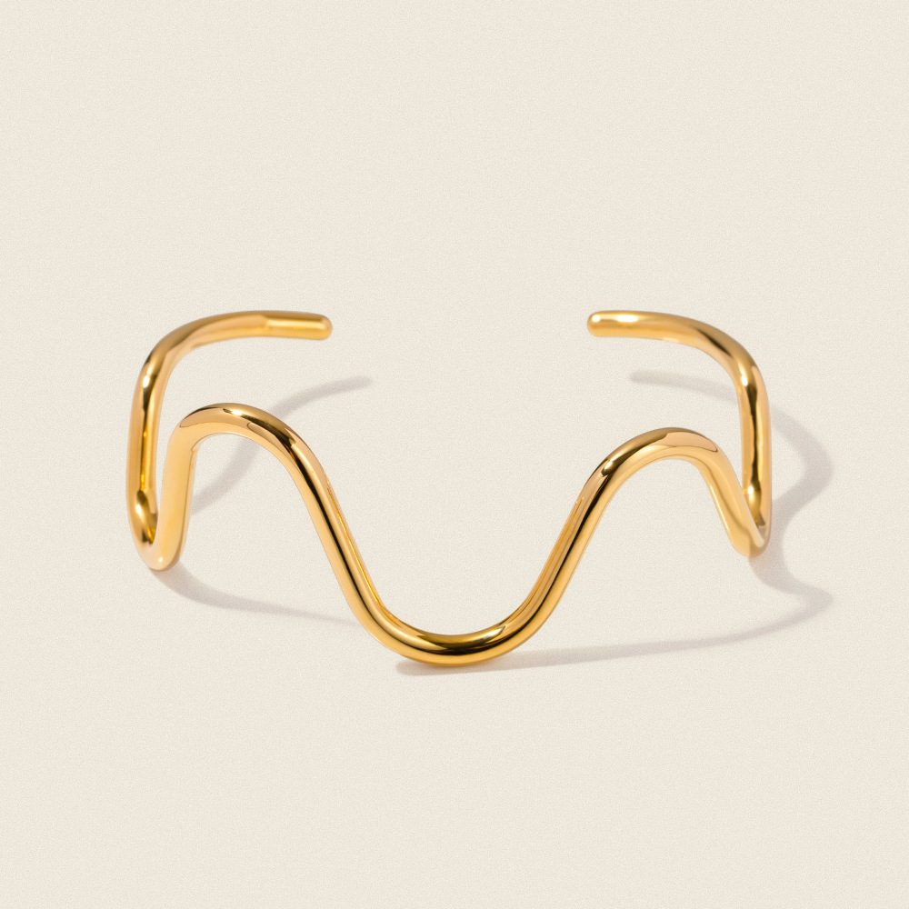 Brazalete de Acero con Baño de Oro 18K