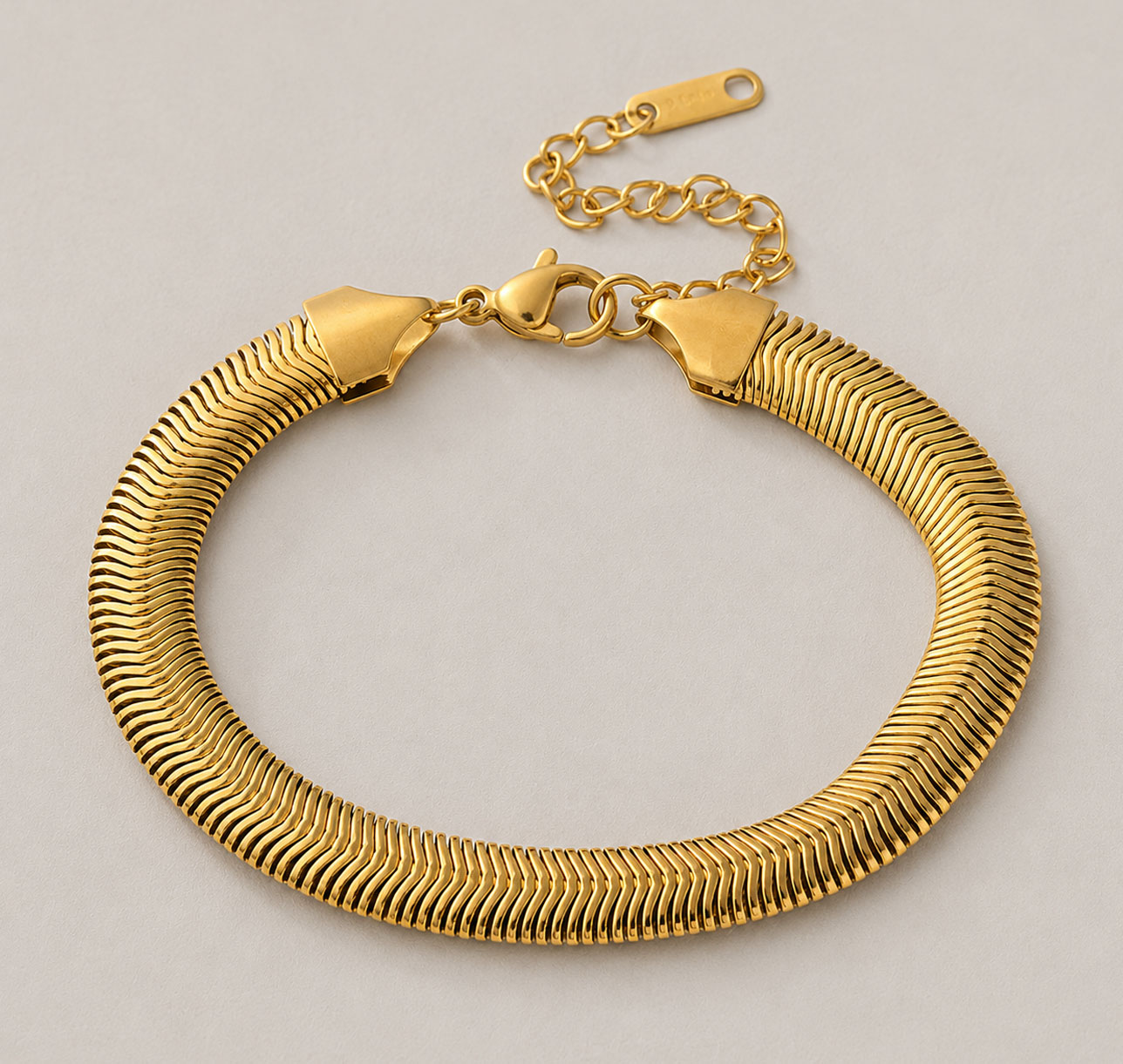 Pulsra acero quirúrgico serpiente Oro 18k