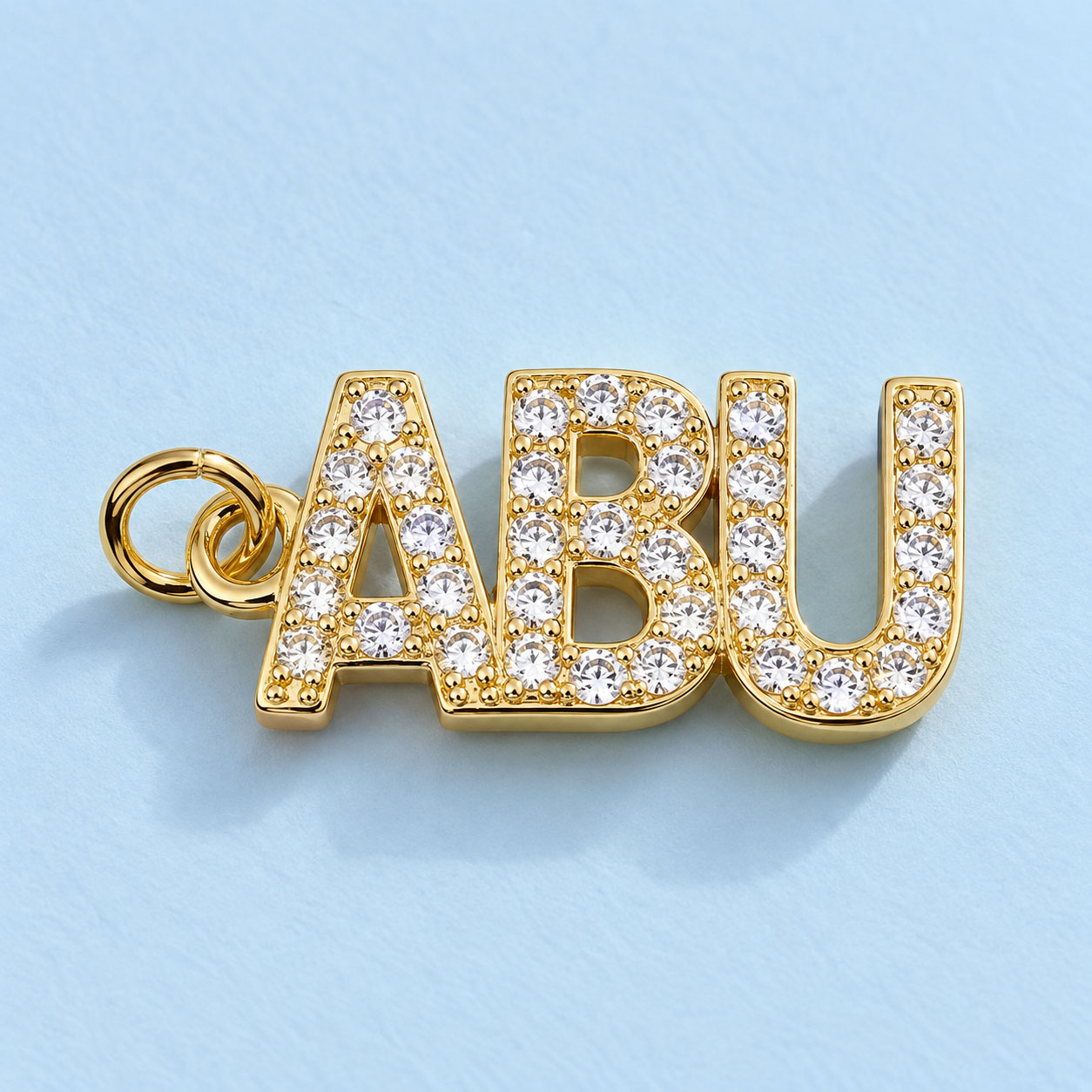 Dije Abu Cubic Zirconia Dorado