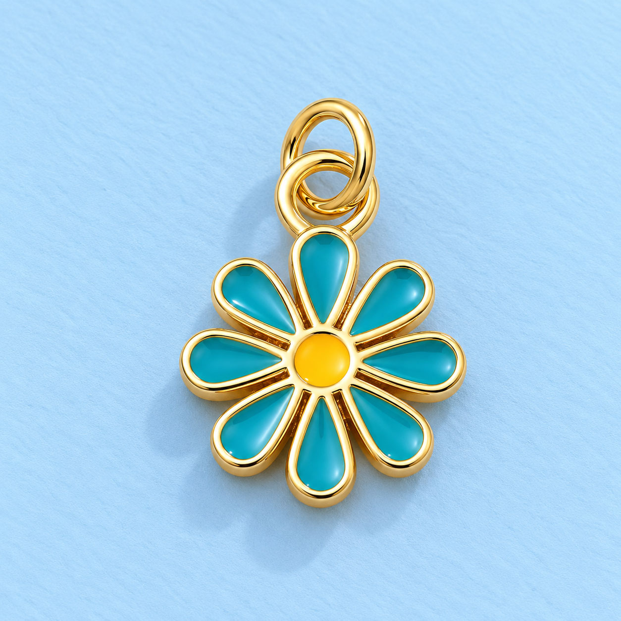 Dije Flor Turquesa Dorado 18k