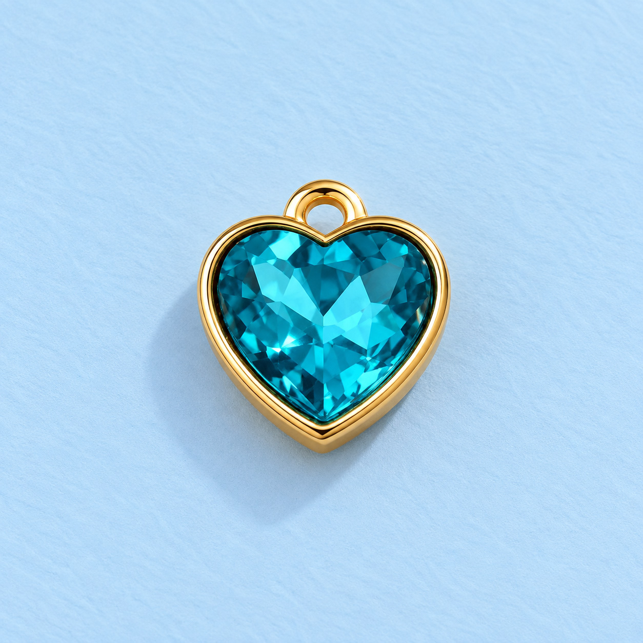 Dije Corazón Dorado Arena Turquesa